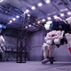 Illustration for article titled Model Hangars Look Much Better With Tiny Mecha Inside